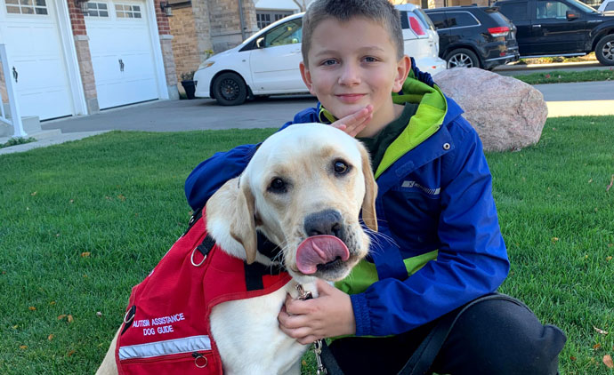 180+ Dog Guides Sponsored - A Boy with his service dog